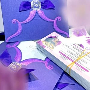 Petal Romantic Wedding Cards in Uganda—elegant maroon and purple invitation cards with a petal-fold design, perfect for stylish, intimate, or luxury-themed wedding celebrations.