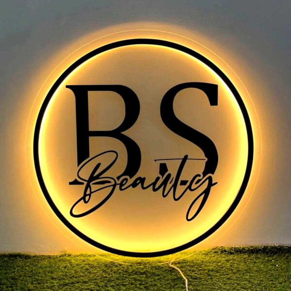 2D Lighting Signage with illuminated front panel design, modern LED light effect, used for shops, branding displays, corporate identity walls and indoor or outdoor advertising installations.